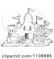 Poster, Art Print Of Black And White Beach Bucket And Ball By A Sand Castle
