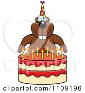Clipart Gopher Making A Wish Over Candles On A Birthday Cake Royalty Free Vector Illustration