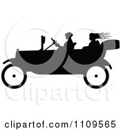 Poster, Art Print Of Silhouetted People In A Vintage Car