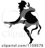Clipart Silhouetted Male Dancer Balanced On His Toes Royalty Free Vector Illustration