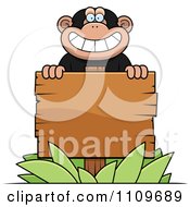 Poster, Art Print Of Chimpanzee Behind A Wooden Sign