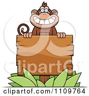 Poster, Art Print Of Monkey Behind A Wood Sign