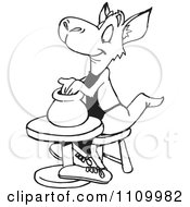 Clipart Black And White Aussie Kangaroo Using A Pottery Wheel Royalty Free Vector Illustration