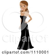 Beautiful Brunette Woman Posing In A Formal Black Gown