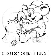Clipart Black And White Aussie Koala Making A Sand Castle Royalty Free Vector Illustration