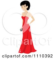 Beautiful Woman With Short Hair Posing In A Formal Red Gown