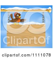 Poster, Art Print Of Christmas Robin Presenting On A Wooden Shingle Sign With Snow