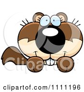 Clipart Cute Happy Baby Squirrel Hanging On A Sign Royalty Free Vector Illustration