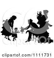 Silhouetted Family Playing In Black And White