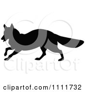 Clipart Silhouetted Fox In Black And White Royalty Free Vector Illustration