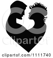 Poster, Art Print Of Silhouetted Embracing Couple Forming A Heart In Black And White