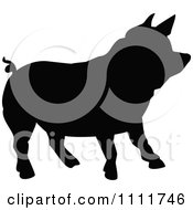 Clipart Silhouetted Pig In Black And White Royalty Free Vector Illustration