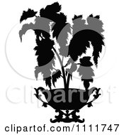 Clipart Silhouetted Potted Plant In Black And White Royalty Free Vector Illustration