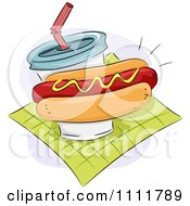 Hot Dog With Mustard And A Soft Drink On A Green Napkin