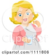 Happy Female Senior Citizen Holding A Glass Of Water And A Pill