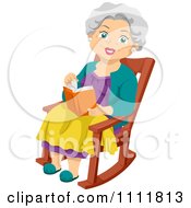 Happy Female Senior Citizen Reading In Her Rocking Chair
