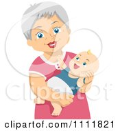 Poster, Art Print Of Happy Female Senior Citizen Holding A Baby Grandchild