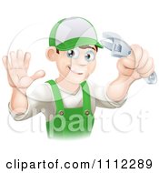 Poster, Art Print Of Happy Male Worker Holding A Thumb Up And A Wrench