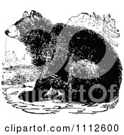Clipart Vintage Black And White Bear Sitting Royalty Free Vector Illustration