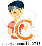 Poster, Art Print Of Happy Asian School Boy Holding A Letter C