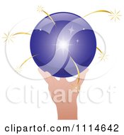 Poster, Art Print Of Hand Holding A Shiny Purple Sphere With Gold Sparks