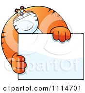 Clipart Buff Tiger Holding A Blank Sign 1 Royalty Free Vector Illustration