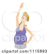 Fit Blond Pregnant Woman Stretching Or Doing Yoga