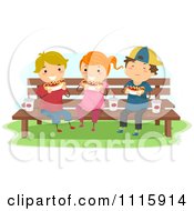 Happy Kids Eating Hot Dogs On A Bench