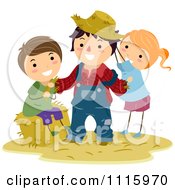 Clipart Happy Kids Dressing Up A Scarecrow Royalty Free Vector Illustration