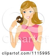 Happy Blond Woman Eating A Chocolate Donut