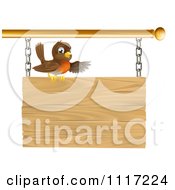 Happy Robin Bird Presenting On A Wood Sign