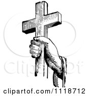 Clipart Of A Retro Vintage Black And White Hand Holding A Cross Royalty Free Vector Illustration