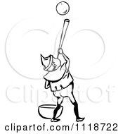 Clipart Of A Retro Vintage Black And White Christmas Elf Blowing A Bubble Royalty Free Vector Illustration