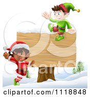 Happy Christmas Elves Jumping By And Sitting On A Sign