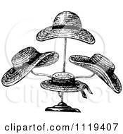 Clipart Of Retro Vintage Black And White Straw Hats On A Stand Royalty Free Vector Illustration