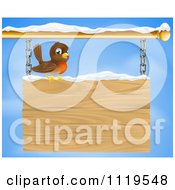 Poster, Art Print Of Happy Robin Bird With Snow On A Wood Sign Against The Sky