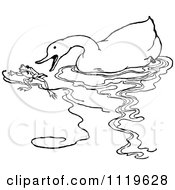 Clipart Of A Retro Vintage Black And White Duck Chasing A Frog Royalty Free Vector Illustration
