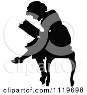 Clipart Of A Retro Vintage Silhouetted Woman Reading Royalty Free Vector Illustration