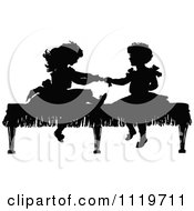 Clipart Of Retro Vintage Black And White Silhouetted Girls Playing On A Bench Royalty Free Vector Illustration