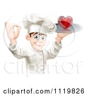 Cartoon Of A Happy Chef Gesturing Ok And Holding A Heart On A Platter Royalty Free Vector Clipart
