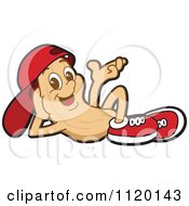 Cartoon Of A Relaxed Cashew Mascot Wearing A Hat And Shoes Royalty Free Vector Clipart