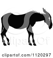 Clipart Of A Silhouetted Sad Donkey Royalty Free Vector Illustration