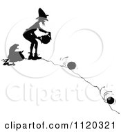 Poster, Art Print Of Silhouetted Man Rolling Cheese Down A Hill