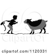 Clipart Of A Silhouetted Boy Talking To A Sheep Royalty Free Vector Illustration