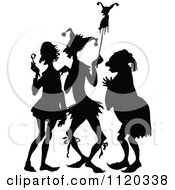 Clipart Of A Silhouetted Jester And Men Royalty Free Vector Illustration