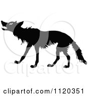 Clipart Of A Wolf Silhouette Royalty Free Vector Illustration