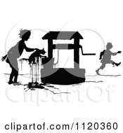 Silhouetted Kid Saving A Cat From A Well