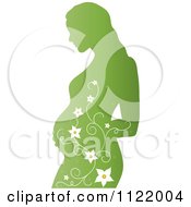 Clipart Of A Green Silhouette Of A Pregnant Mother With Vines Royalty Free Vector Illustration