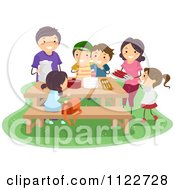 Poster, Art Print Of Happy Family Surrounding A Picnic Table