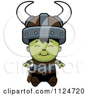 Cartoon Of A Happy Ogre Boy Sitting Royalty Free Vector Clipart